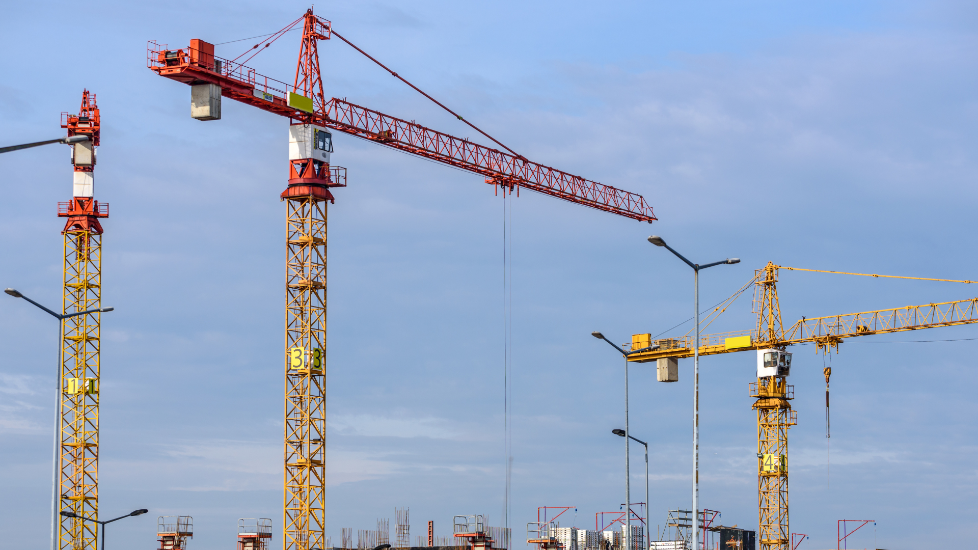 Construction cranes on a site being developed for a foreign direct investment project