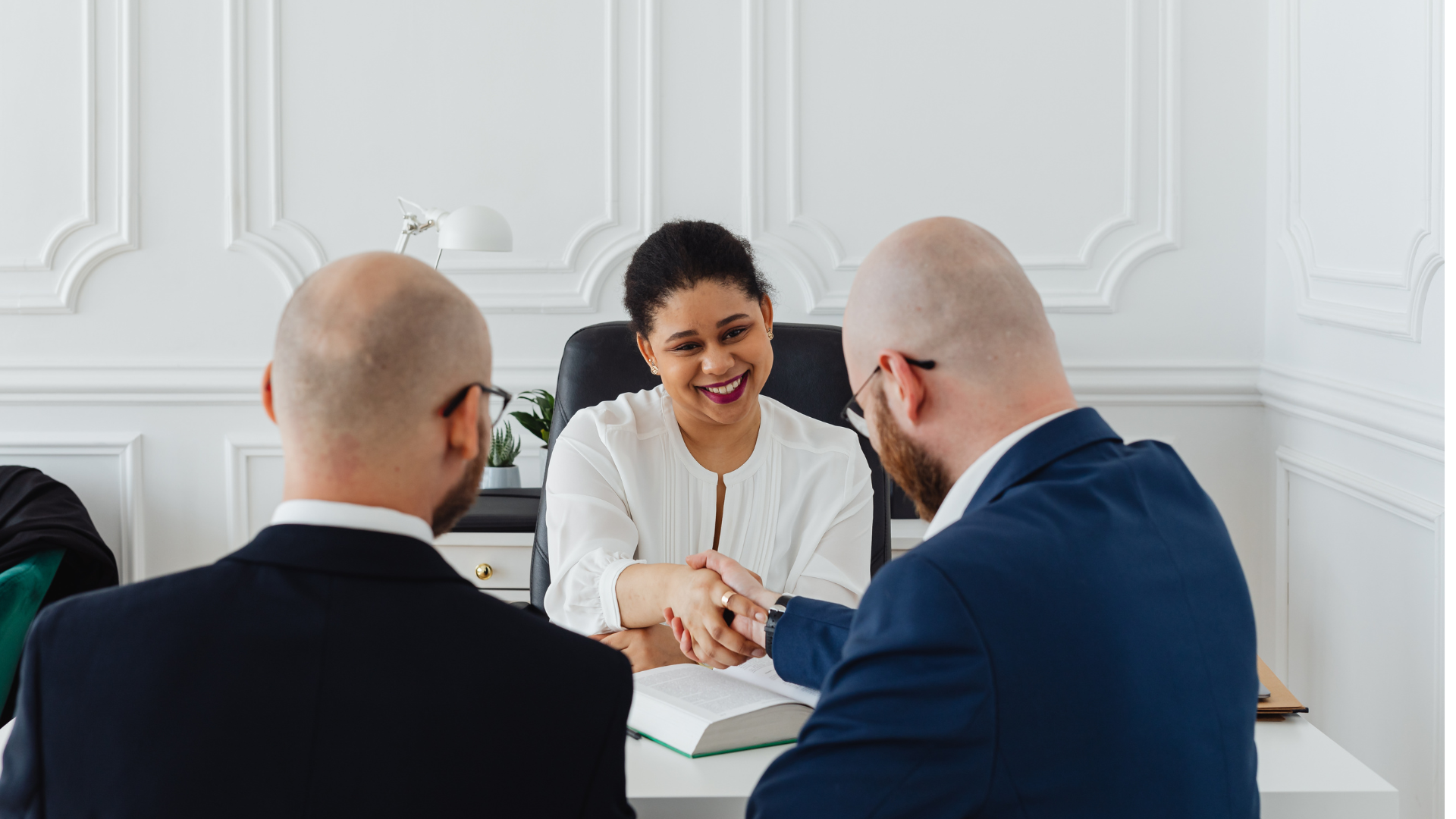 Business meeting closing with a handshake, a sign of repeat customer relationships in a new market